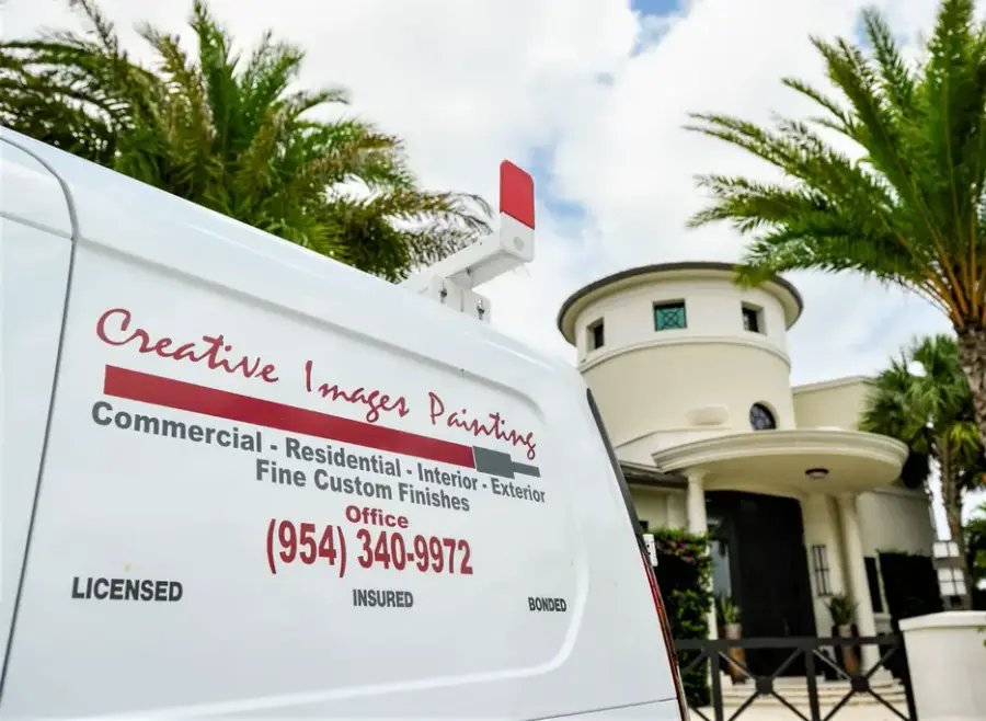 The Creative Images Painting company van, lettered with the company wordmark and Florida license number U-17482, parked outside a Boca Raton home